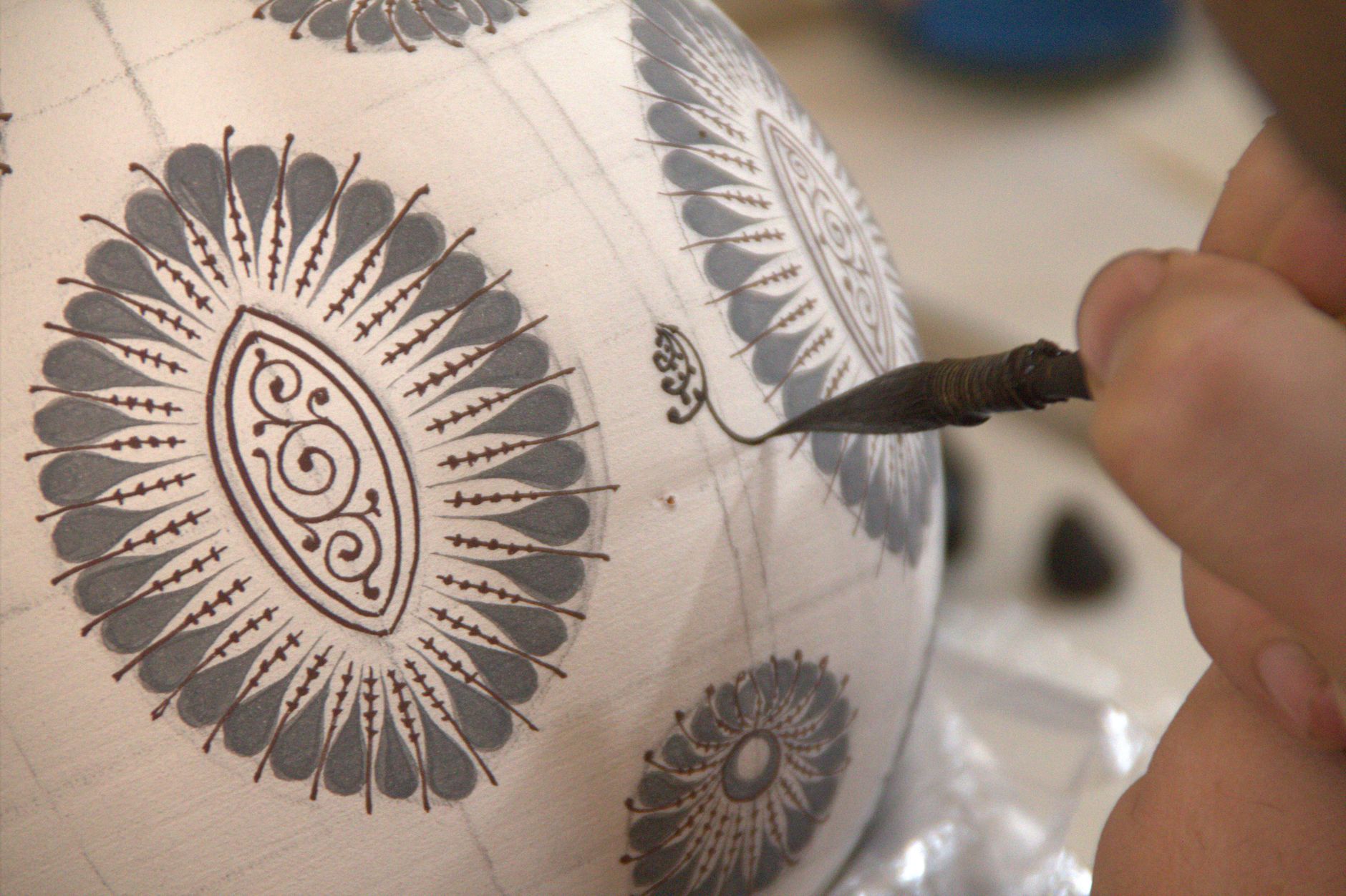 Intricate hand-painted designs on Uzbek ceramics in Fargʻona, Uzbekistan · Fergana Valley, Uzbekistan