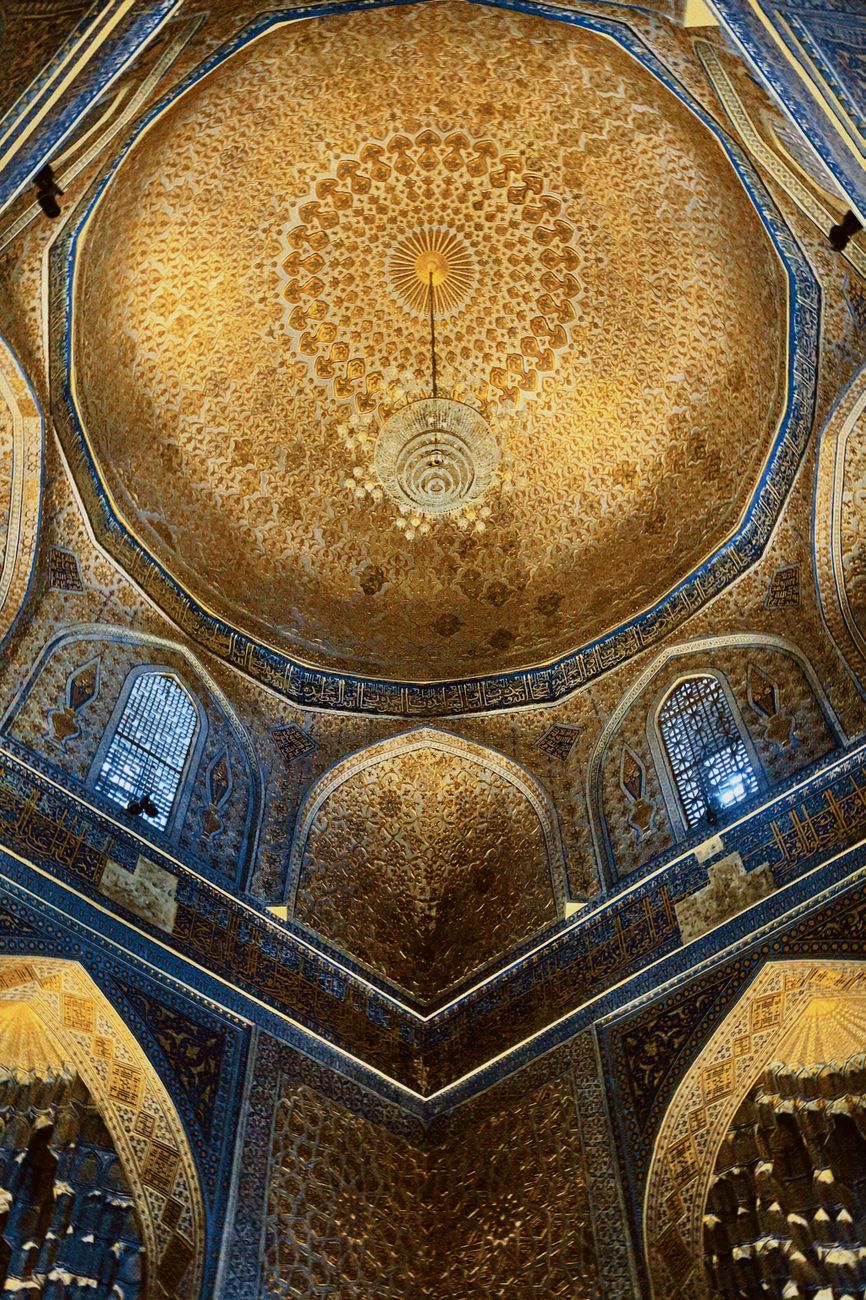 Golden patterned dome interior of Gur-E Amir Mausoleum in Samarkand, Uzbekistan