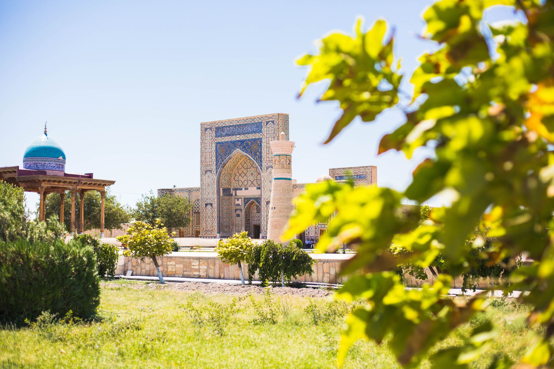 Historic Gijduvon Madrasa amidst green foliage in Bukhara, Uzbekistan · Shakhrisabz, Uzbekistan