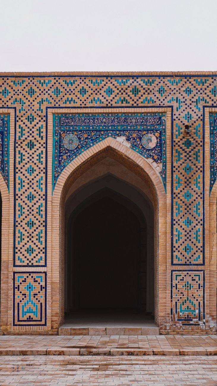 Stunning mosaic tile patterns on a historic Bukhara building, showcasing Islamic architecture · Shakhrisabz, Uzbekistan