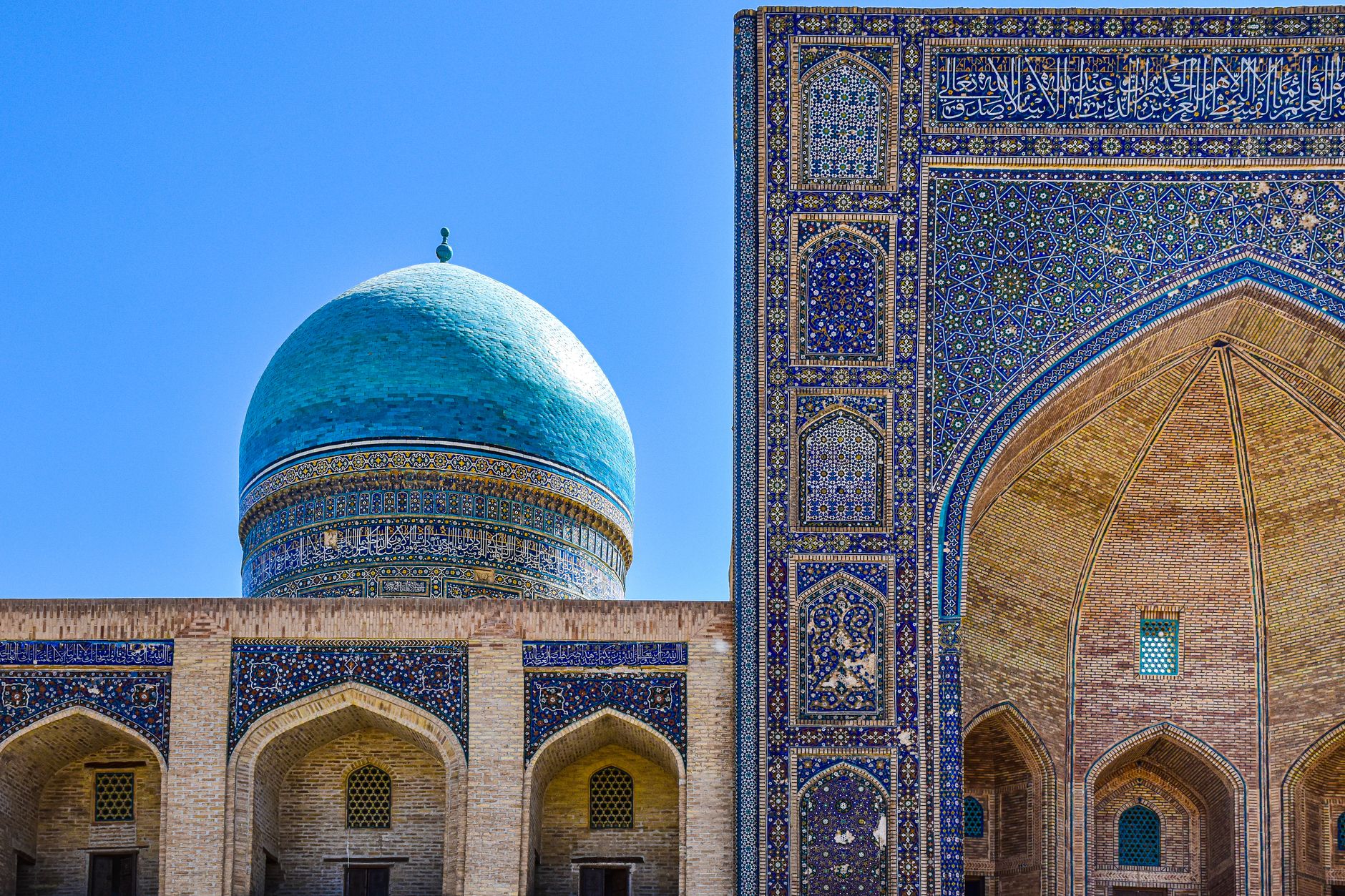 Architectural details of the Mir-I-Arab Madrasa in Bukhara, showcasing Islamic artistry, Uzbekistan
