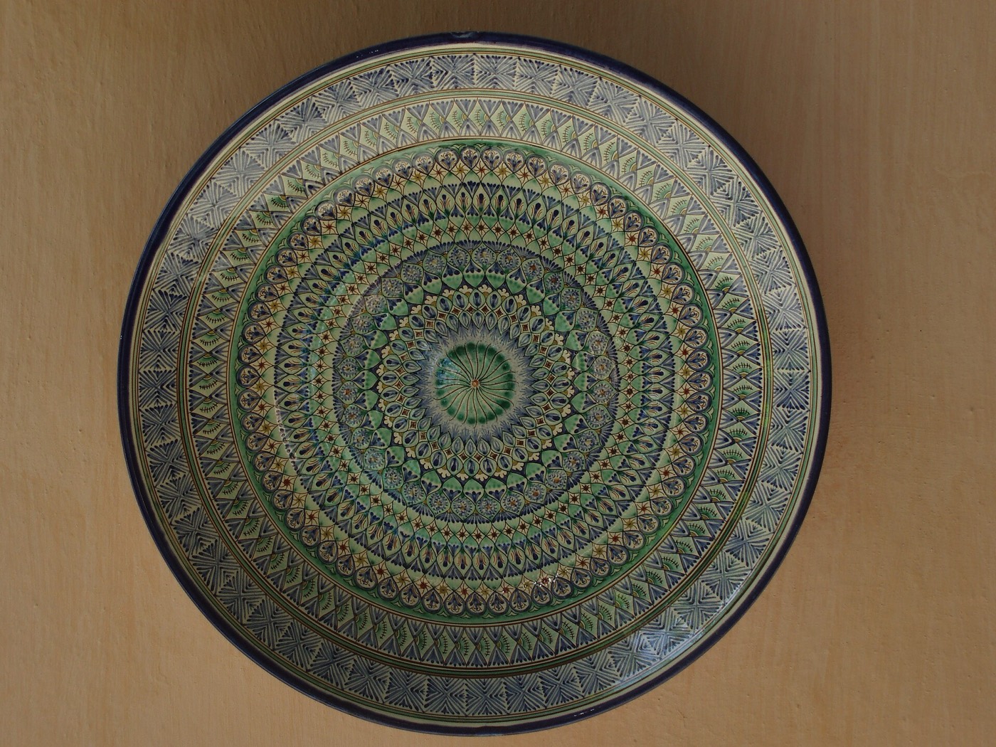 Blue and turquoise Rishton ceramic bowls and plates on display